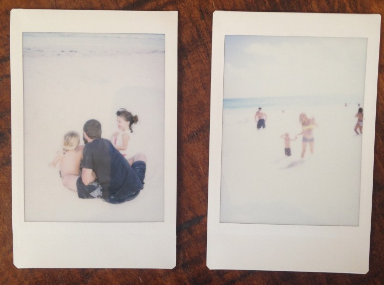 Bright and shiny sand. Raines Wilder, Aaron, and Kai (a beach friend). Yeah, and then there's me and the boy, all bleached out in the sun